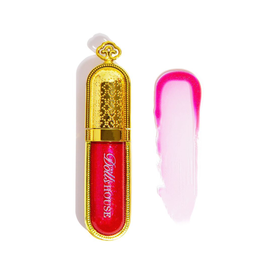 cherished is a red lip gloss with a pink tint and pink sparkle