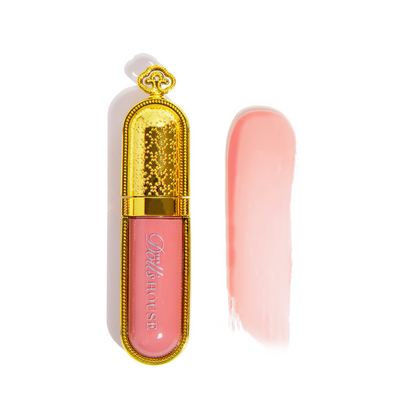 a pink nude lip gloss with a high shine finish that lasts all day