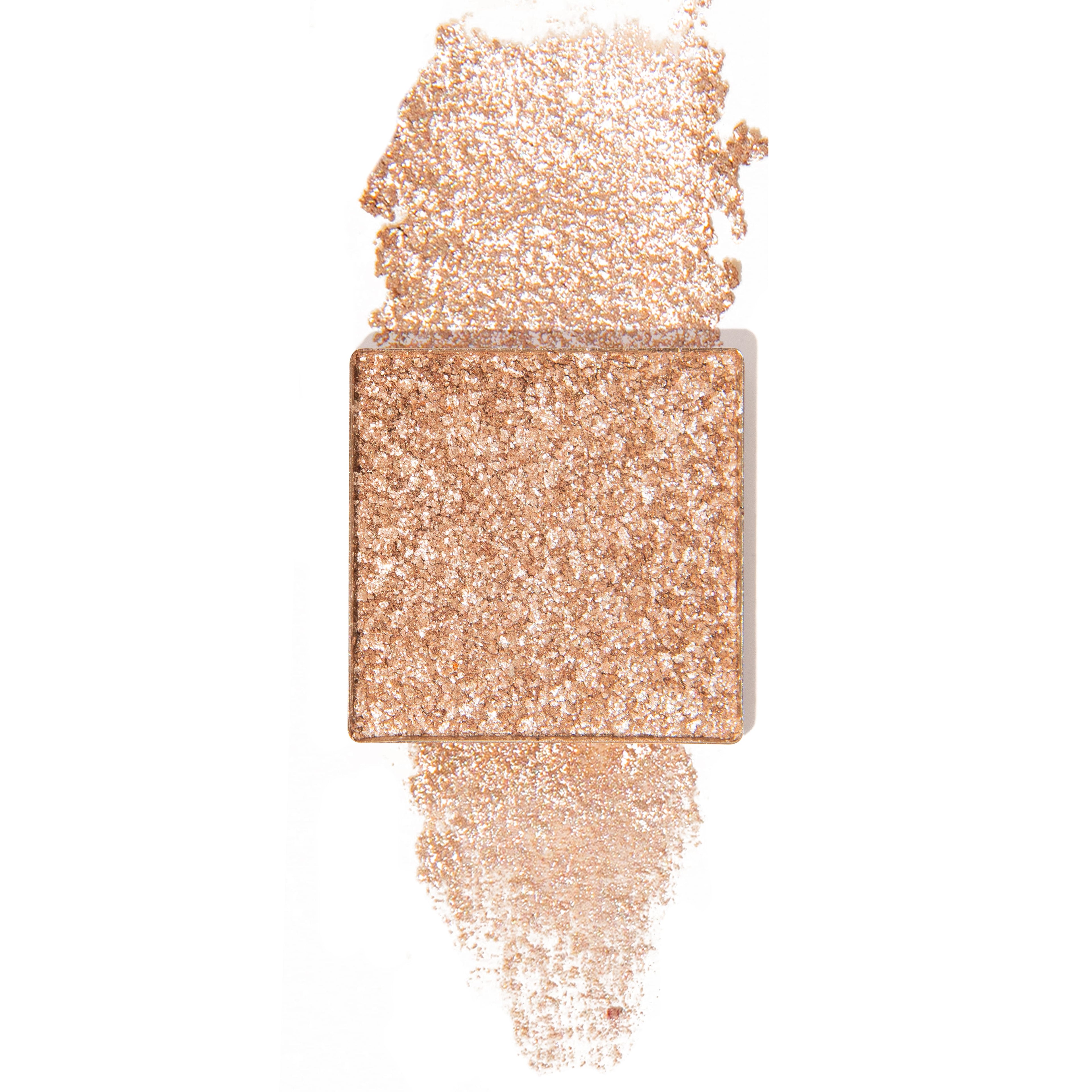 pixie wings is a champagne gold pressed glitter eyeshadow