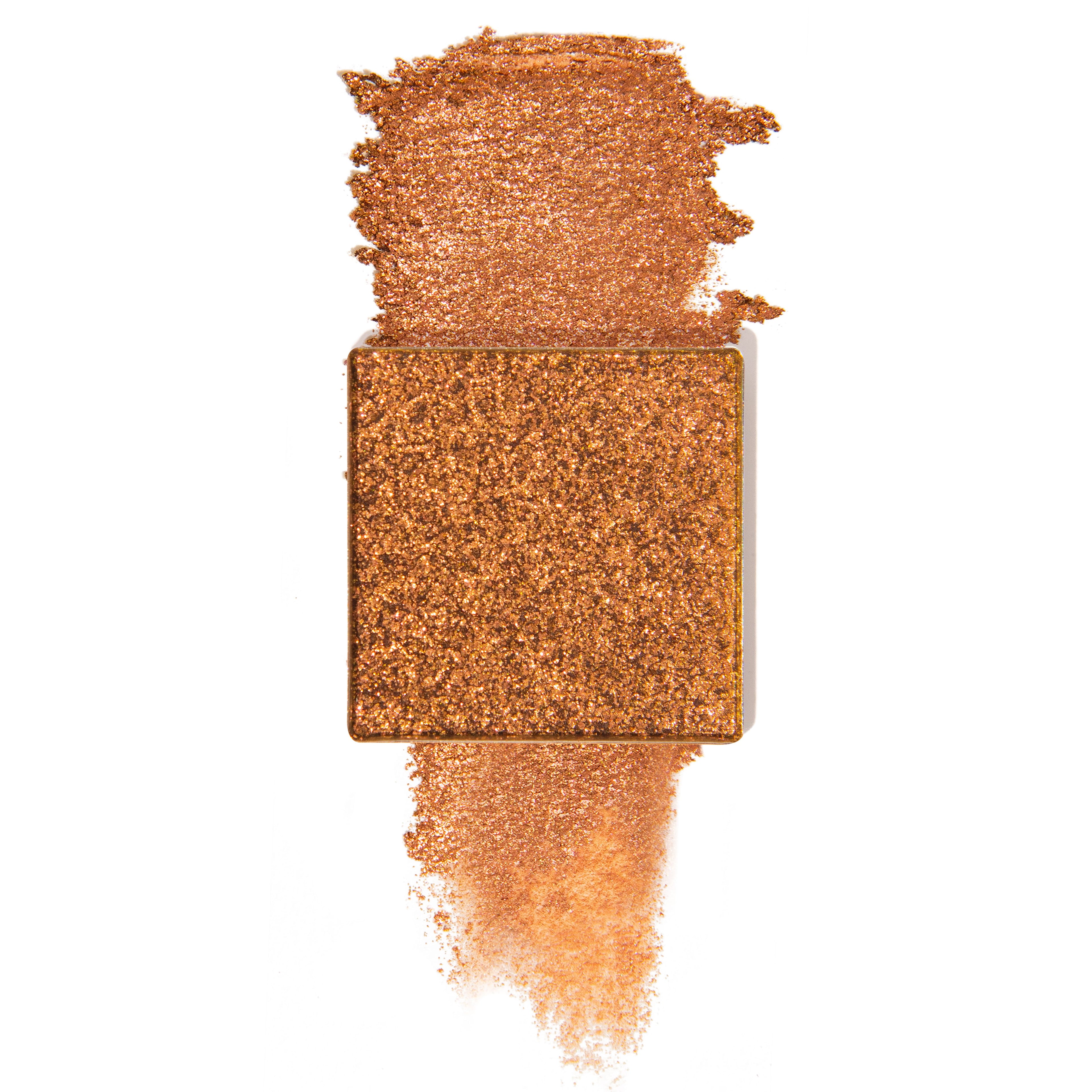 treasured kingdom is a copper pressed glitter eyeshadow